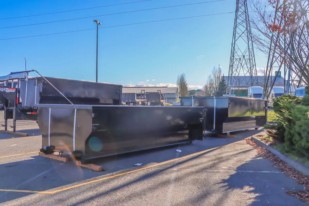 Roll-off dumpster ready for waste disposal at job site for 2 Yard Dumpster Rental in Marion